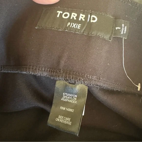 Torrid | Studio Slim Fix Black Faux Leather & Premium Ponte Pull-On Pixie Pant - Picture 7 of 7